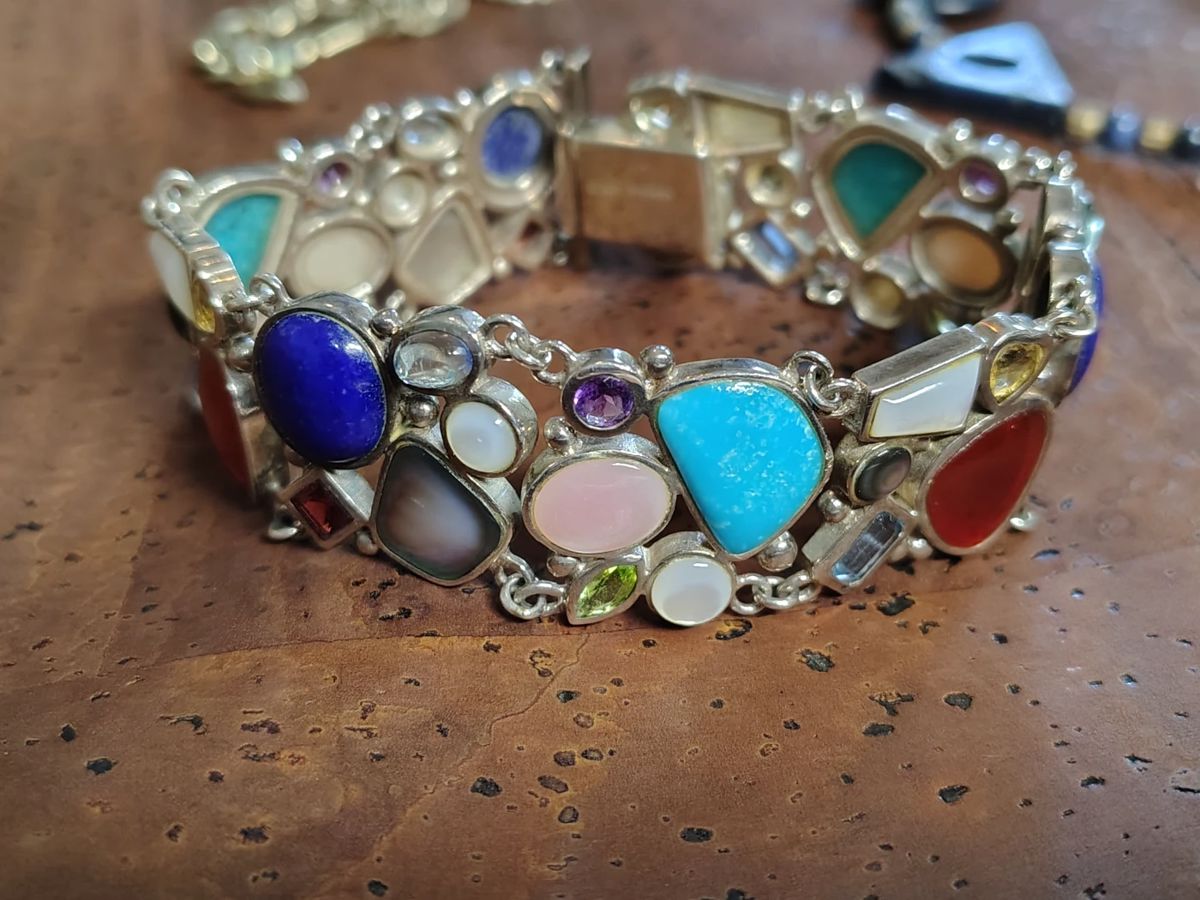 Very nice multi stone turquoise peridot lapiz moonstone and amethyst bracelet.