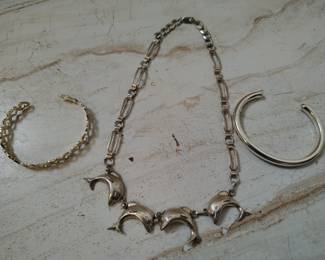 Sterling dolphin chain and bracelets.