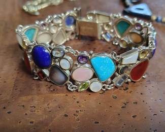 Very nice multi stone turquoise peridot lapiz moonstone and amethyst bracelet.