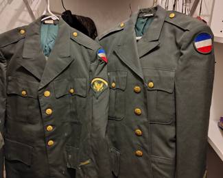 Vintage army uniforms WW2 and Vietnam era.