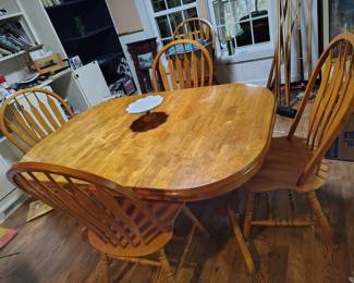 Nice farmhouse table with chairs.