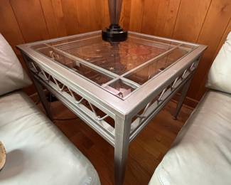 Glass, metal and wood square accent table. Decorative wood insert top under glass.