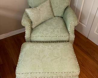 Chair and ottoman with custom fabric and trim by Hickory Chair Company