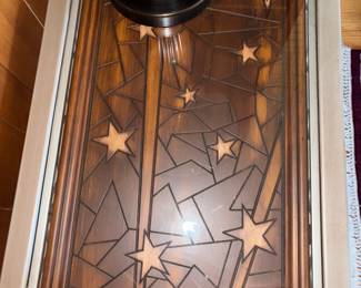 details of wood under glass top table