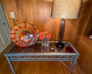 Console table metal base with glass top and decorative wood under glass top