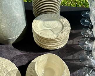 Wedgewood "Queensware" cream on cream 5 piece place setting.  Set includes:  13 dinner plates, salad plates, 11 dessert plates, 12 berry bowls, 17 saucers and 16 cups