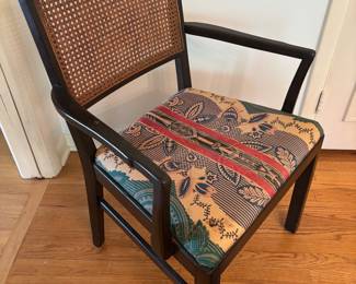 Two arm chairs with cane back and upholstered seat.  Additional fabric available