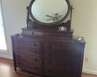 Full size dresser with mirror in King bedroom suite