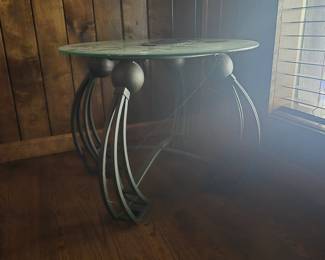 Iron legged, glass top accent table, end tables. we have two and also the matching coffee table.
