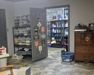 Ladies shoes on left on rack, Fan Club room. and another basement room with Oriental mid-century chest of drawers, vintage TV, laundry basket, Brothers sewing machine