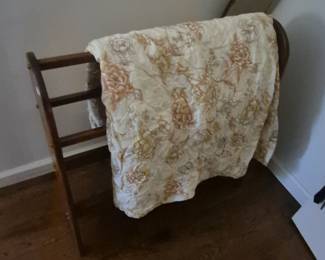 1980s quilt rack, vintage bedspread