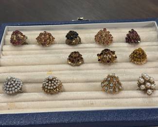 14 karat gold, 18 karat gold, sterling silver, Ruby, Opal, Garnet, citrine, and pearls.