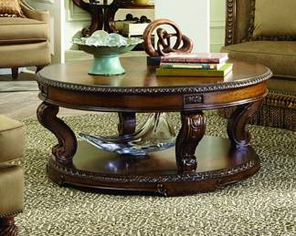 Lot 18: Ornate Round Coffee Table in Mahogany Finish