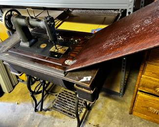 #197	treadle sewing machine in case with 4 drawers 	 $30.00 			
