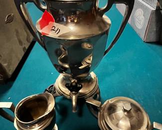 #211	silver electric percolator with sugar cream 	 $125.00 			
