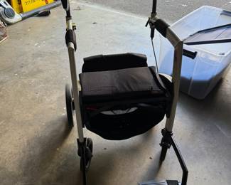 #163		Rollzmotion light weight wheel chair walker . It converts in seconds. 	 $500.00 	 reserve 400 		
