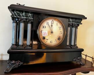 #23	Antique Brass Feet w/marble top w/columns - Ingraham Brand Mantle Clock w/key - 16x6x11	 $175.00 			
