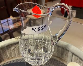 #228	kc	crystal pitcher 8.5 tall 	 $30.00 			
