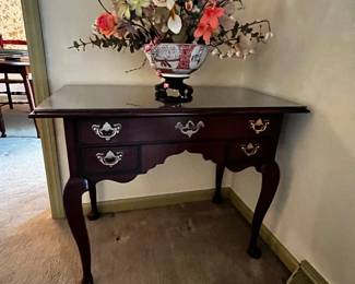 #27	Hickory Chair Company Wood End Table w/q/a Legs & 3 drawers  (top drawer locks w/key) w/glass protect Glass 34x20x27	 $175.00 			
