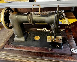 #197	treadle sewing machine in case with 4 drawers 	 $30.00 			
