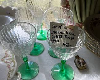 #121	Uraninum Wine Glasses w/twisted Stems - Set of 6	 $48.00 			
