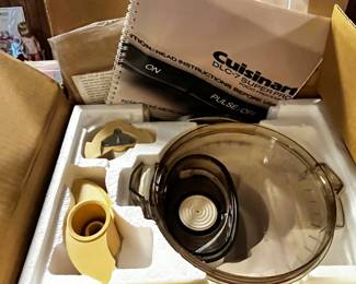 #223	Cuisinart old/ new   "1984" DL-7 supper pro food processer in box with book 	 $30.00 			
