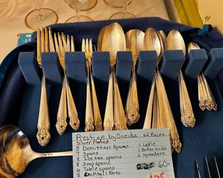 #125	Presteige by "Oneida" Silverplate  Flatware - 62 Pieces inTray	 $65.00 			
