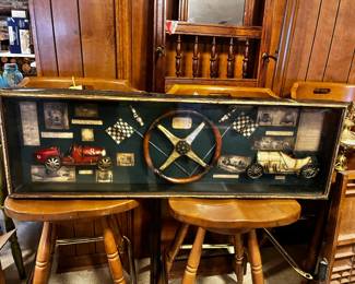 #222	shadow box of antique car parts décor 42x13	 $50.00 			

