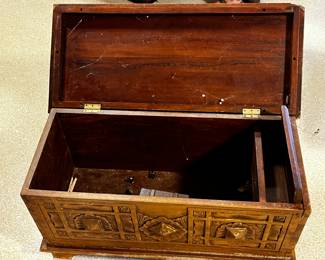 #216	wood small trunk carving top drawer on inside 30x13x17	 $65.00 			

