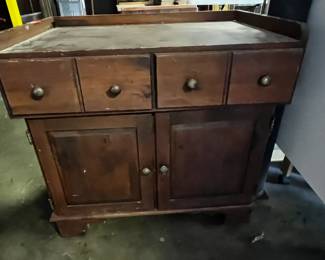 #172	pine wash stand with 2 doors and 2 doors on wheels 30x19x28	 $150.00 			
