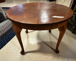 #224	crafted round oak end table  23 round x 17	 $75.00 			
