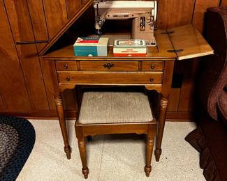 #65	Singer Brown 404 Sewing machine in Cabinet  w/stool	 $45.00 			
