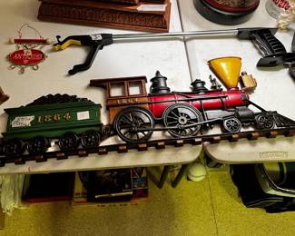 #149	Sexton made in USA metal wall hanger of a train	 $25.00 			
