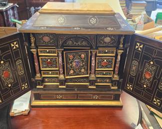Cabinet of Curiosities. Olantigh Towers, Kent England c 1870. From the estate of J.S.W.S Erle- Drax, MP. This Cabinet of Curiosities survived the 1903 fire which destroyed the estate. Ebonized wood with bone inlay and semi-precious stones.