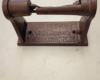 vintage cast-iron toilet paper holder