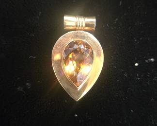 Moster 14k gold pendant with possible topaz gemstone