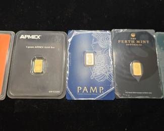 1 gram gold bars in assay cards from various mints