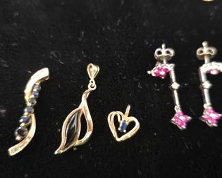 14k gold pendants with sapphires and others.