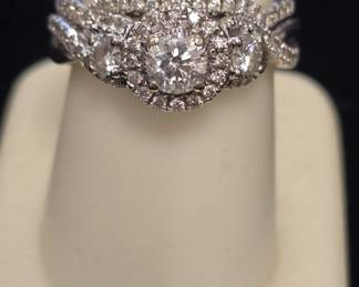 14k white gold Halo Bridal wedding Ring 1karat diamond in middle with smaller on sides BEAUTIFUL!! pics don't capture the how nice some of this Jewelry come see in person!!