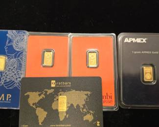 1 gram gold bars in assay cards from various mints