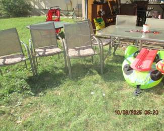 glass top outdoor table with 6 chairs