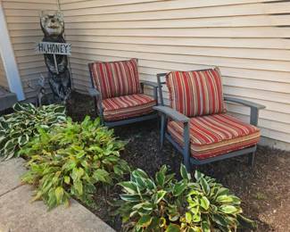 Like new metal patio chairs with cushions.