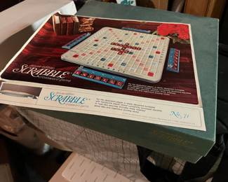 Deluxe Scrabble, Trivial Pursuit, T.P. Bonus pack, Boggle, and another kids game