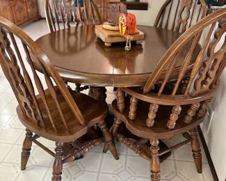 Keller oak dining table with Windsor-style chairs. 
