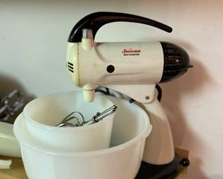 vintage Sunbeam Mixmaster stand mixer.
