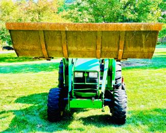4500 John Deere Tractor - excellent working condition - includes multiple implements including a brush hog, a front loader bucket & a back hoe with 2 buckets and a spade.  See all pictures. Recently Serviced. 