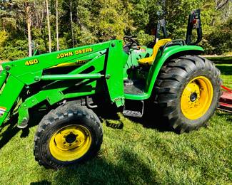 4500 John Deere Tractor - excellent working condition - includes multiple implements including a brush hog, a front loader bucket & a back hoe with 2 buckets and a spade.  See all pictures. Recently Serviced. 