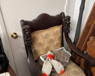 craved heads on chair