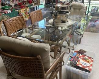 Glass top Table and wicker chairs