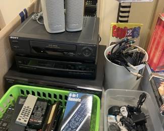 various electronic equipment; remotes, power cords, speakers